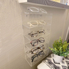 Custodia per occhiali in acrilico trasparente con montaggio a parete
